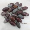 Natural Baan Linga (Banalinga) Shiva Lingam from the sacred Narmada River for Shiva puja, meditation, home temple, and spiritual worship.
