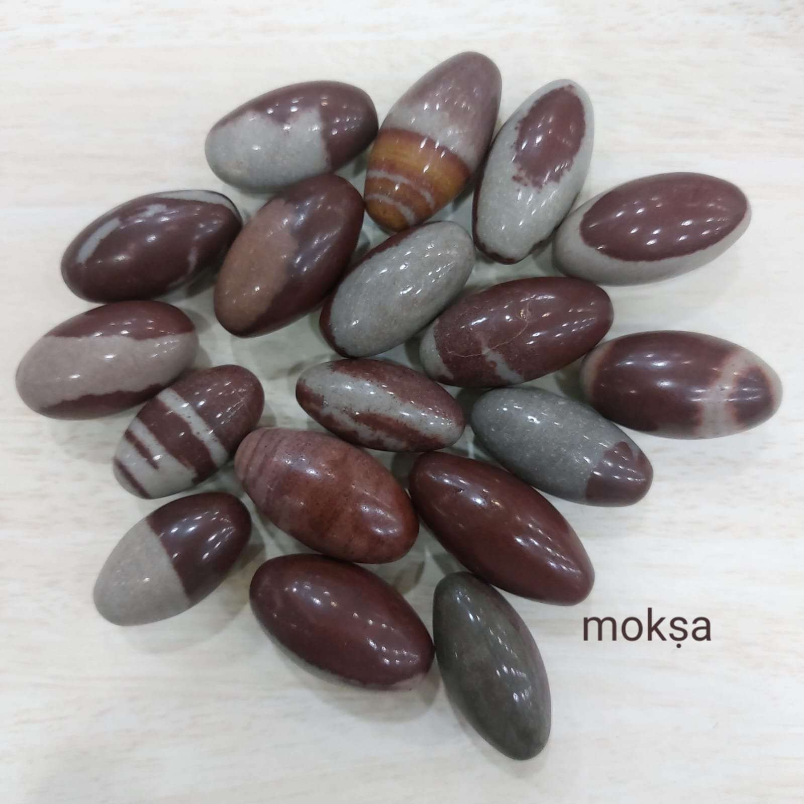 Natural Baan Linga (Banalinga) Shiva Lingam from the sacred Narmada River for Shiva puja, meditation, home temple, and spiritual worship.