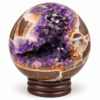 Natural purple Amethyst Geode Eggs and Spheres with sparkling crystal formations